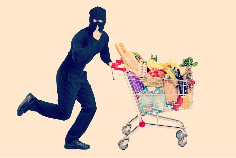 Retail thieves push out trolleys full of unpaid items